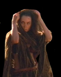 Eve removing wrap from her head