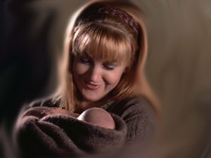 Gabrielle holding baby Hope